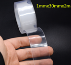 Strip of clear nano tape unrolled over a hand for a DIY tape bubble