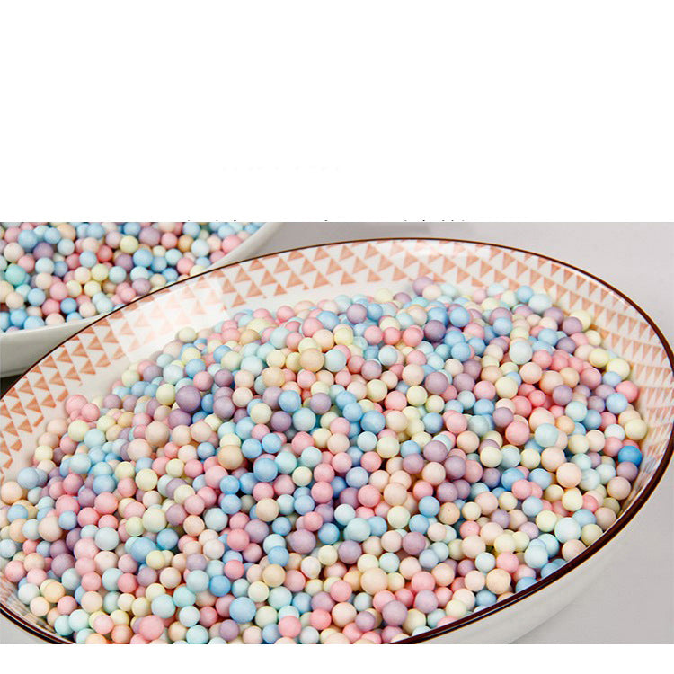 Bowl full of pastel foam beads