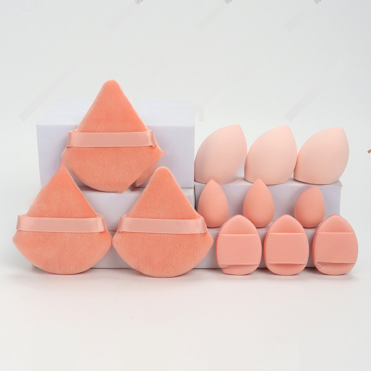 Makeup sponge squishy set in peach, triangle puffs and drop sponges