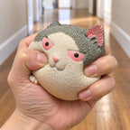 Angry cat squishy soft, being squeezed by hand, soft and squishy