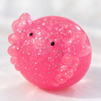 Axolotl Mochi Squishy with Glitter, close-up of the glitter