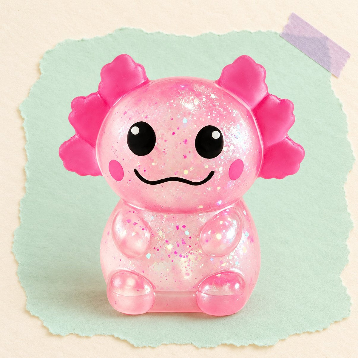 Roze glitter axolotl squishy op pastelkleurig papier