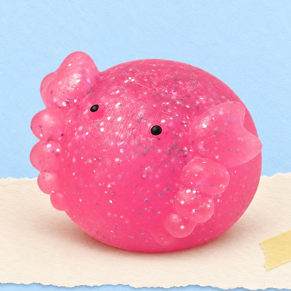 Axolotl mochi-squishy, produktfoto på pastelfarvet papir