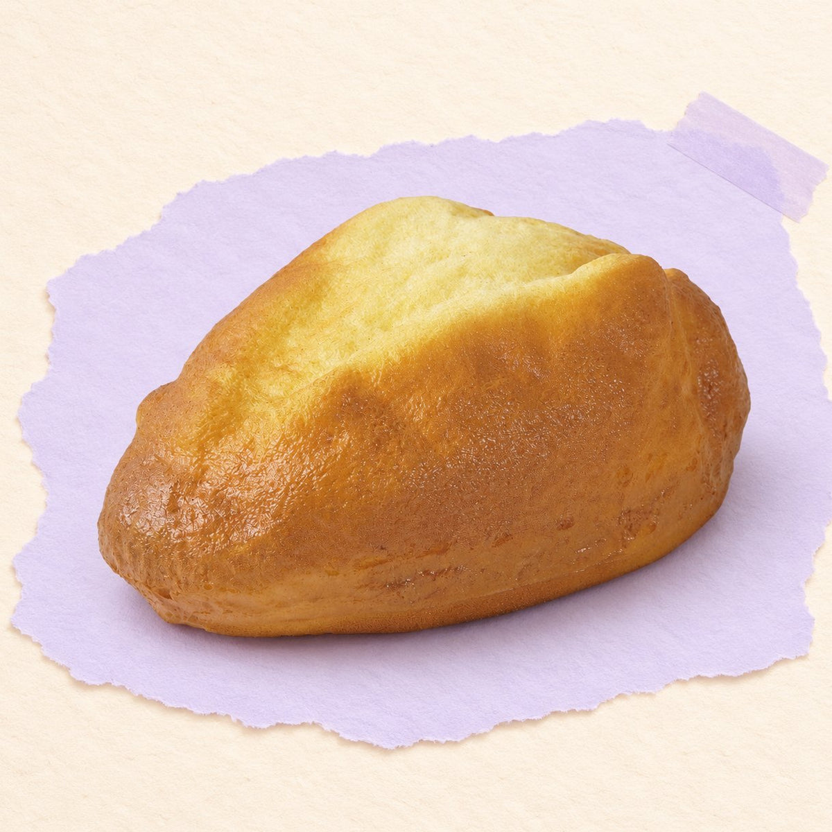 Bauernbrot Squishy, goldbrauner Laib mit 16 cm, auf Pastellpapier