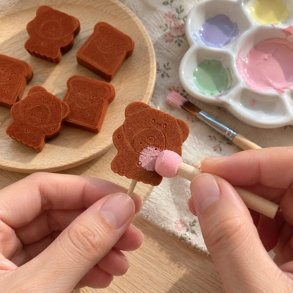Bear craft sponges for DIY squishies, while a bear is painted into a mini squishy