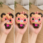 Bear Squishy with Heart Glasses, Slow Rising, 12 cm (Beige), squished flat, half risen and fully back in shape