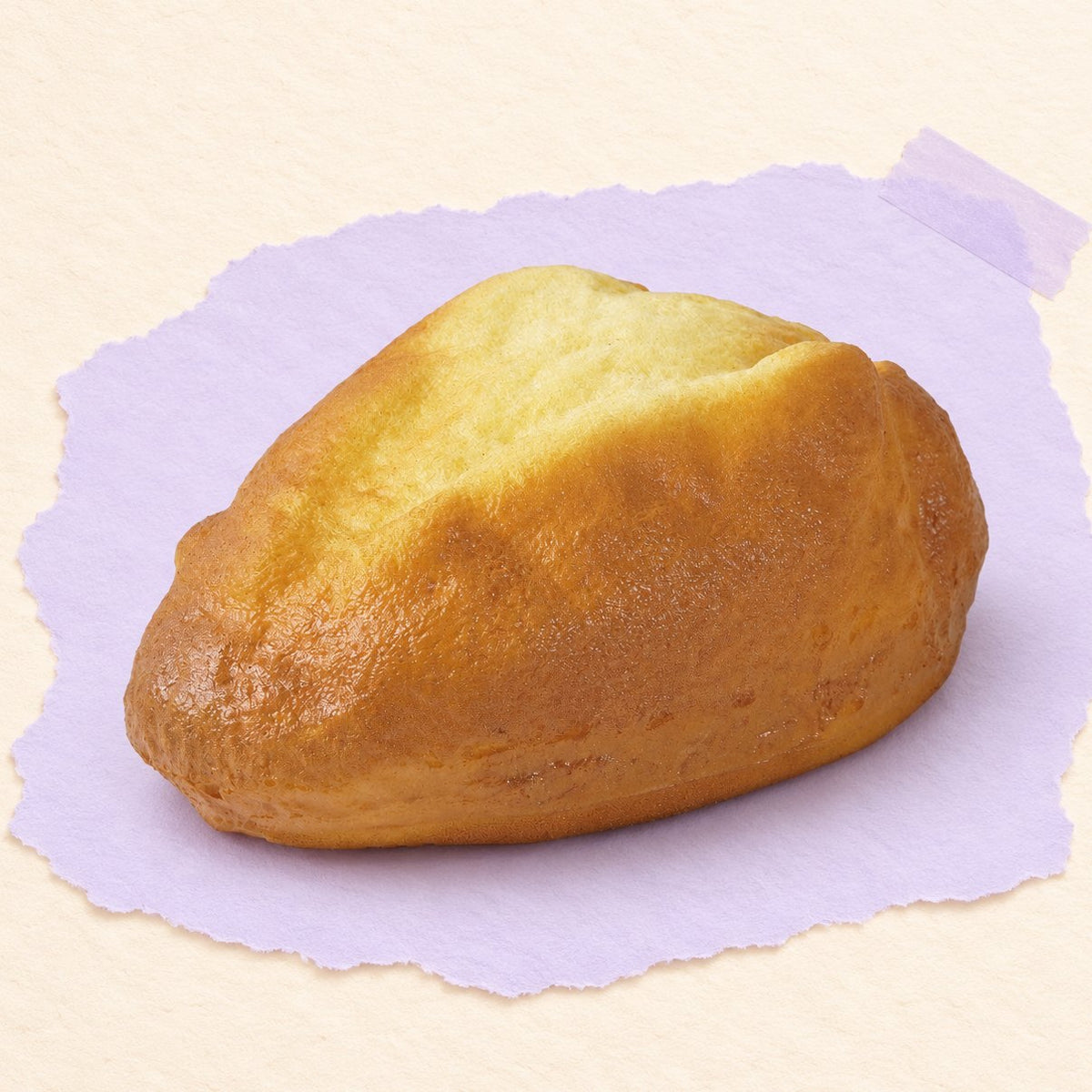 Boerenbrood squishy, goudbruin brood van 16 cm op pastelkleurig papier