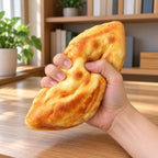 Diamond Bread Squishy, Flat Loaf 20 cm, being squeezed by hand, soft and squishy