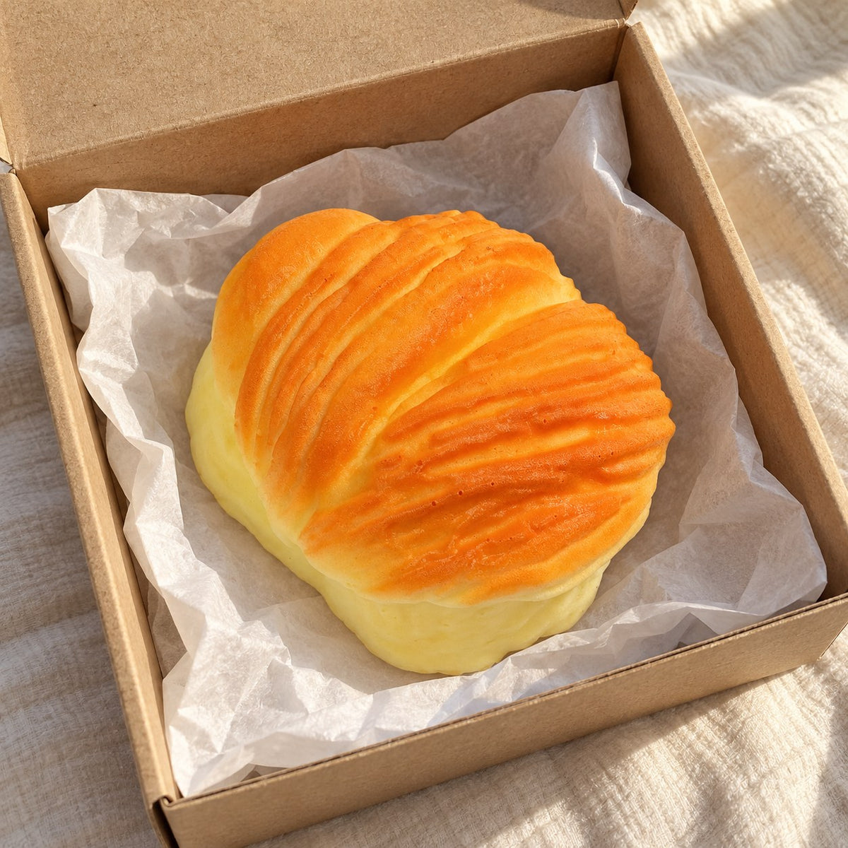 Pastry squishy, unboxed from a parcel with tissue paper