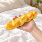 Twisted Bread Squishy, 20 cm Stick, held in a hand to show the real size