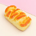 Squishy pão de forma – Squishy pão de forma, estilo brioche 11 ou 15 cm (11 cm), fotografia do produto em papel pastel