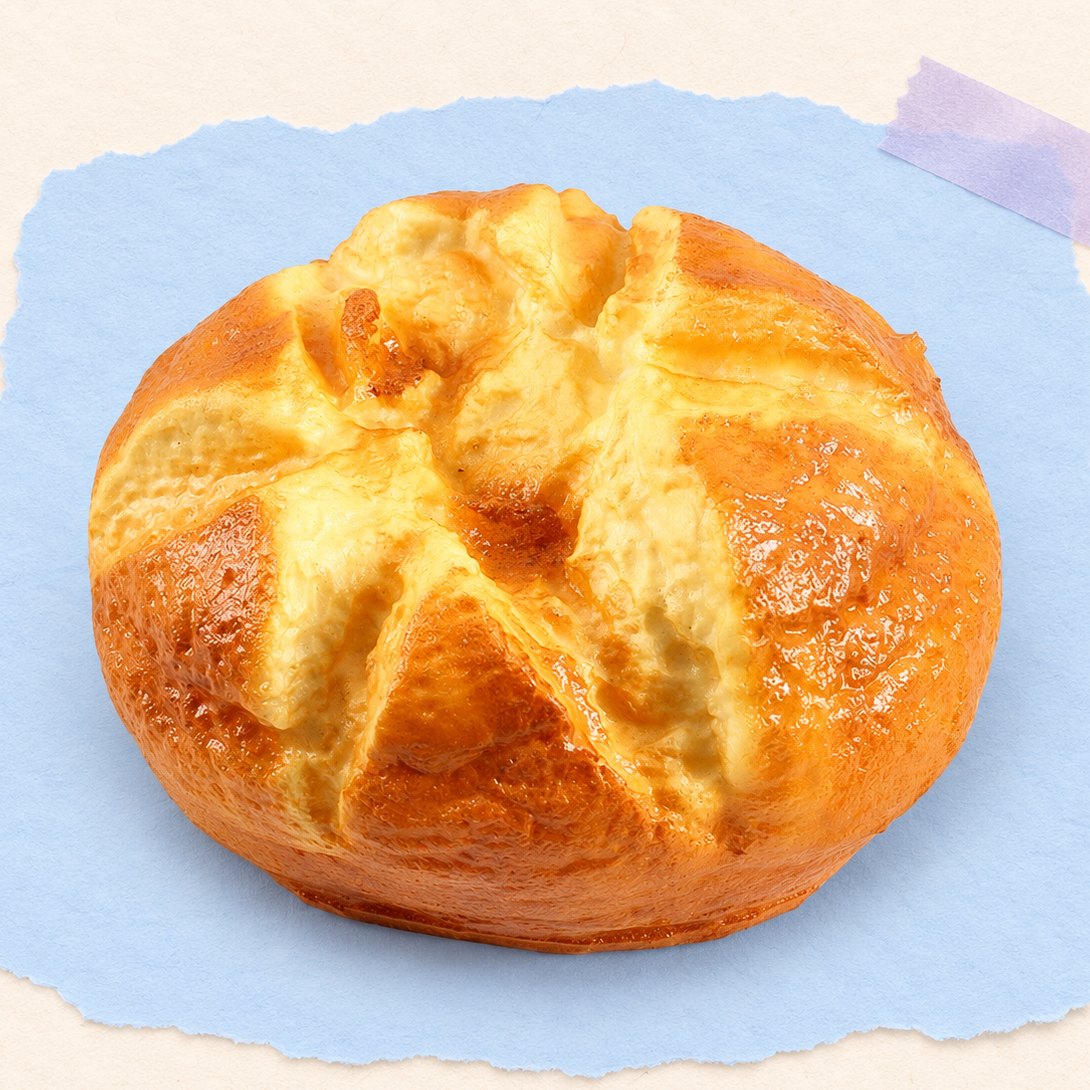 Brødlimpe squishy, rundt brød på 14,5 cm på pastelfarvet papir
