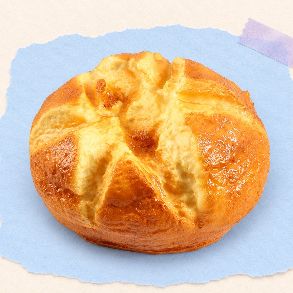 Brotlaib Squishy in Jumbo-Größe, runder Laib mit 14,5 cm, auf Pastellpapier