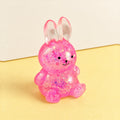 Bunny squishy stretchy – Bunny Squishy with Glitter, Sugar Style, product photo on pastel paper