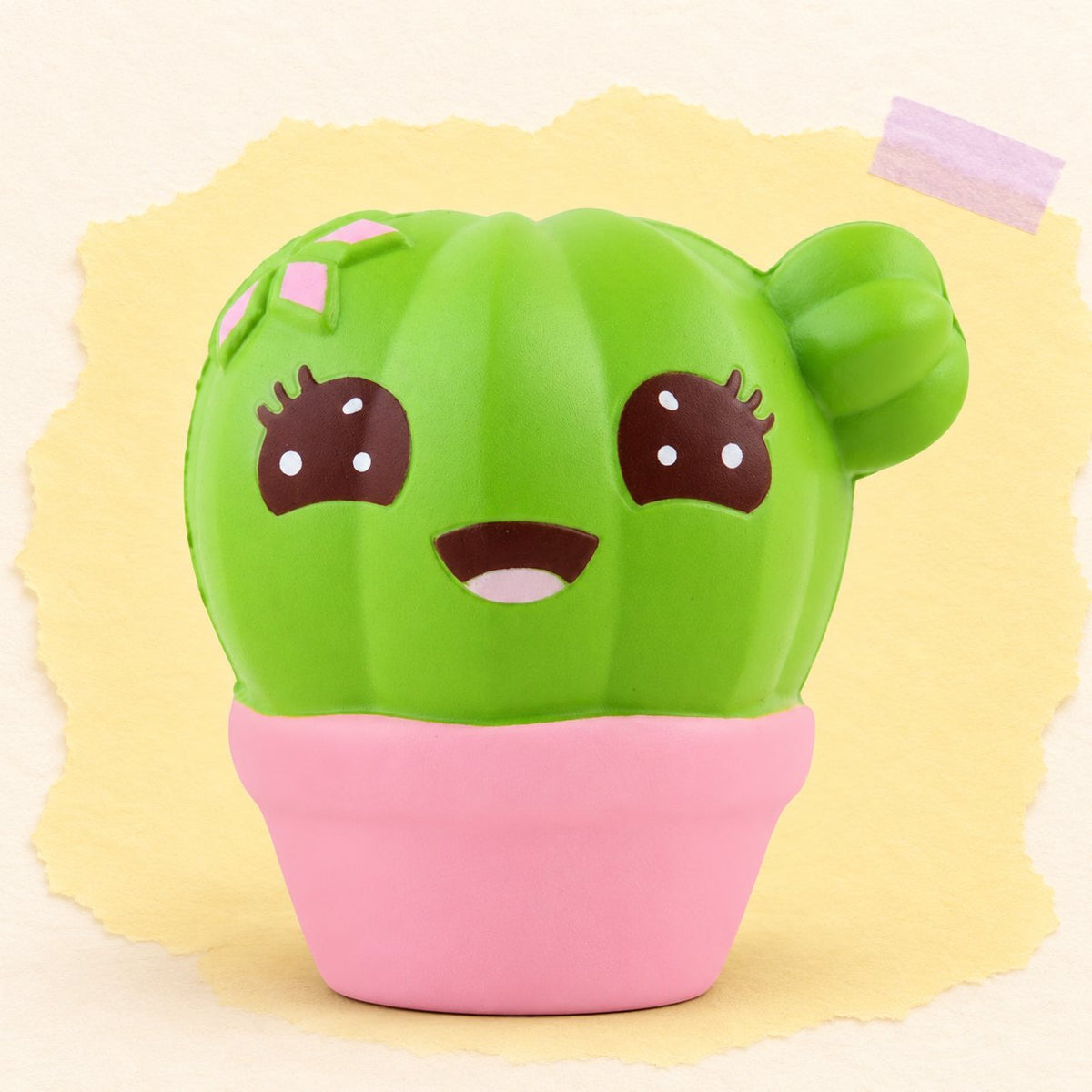 Kawaii cactus squishy in jumbo-formaat op pastelkleurig papier