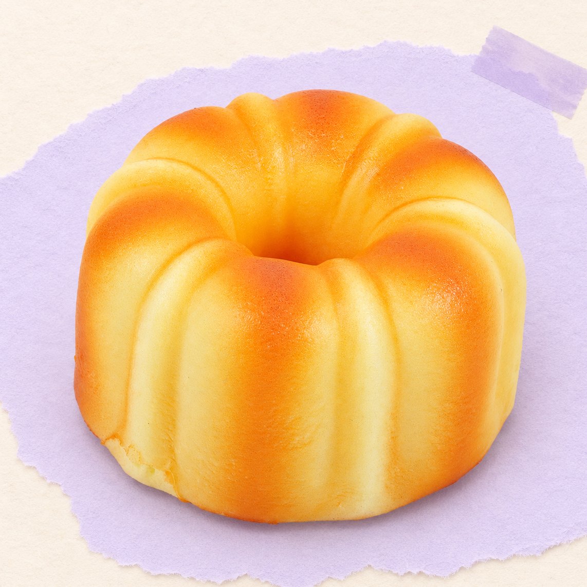 Canelé Squishy, französisches Gebäck mit 9 cm, auf Pastellpapier