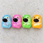 Capybara squishy with glitter, all colors side by side