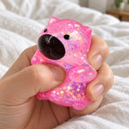 Capybara squishy stretchy (pink), being squeezed by hand, soft and squishy
