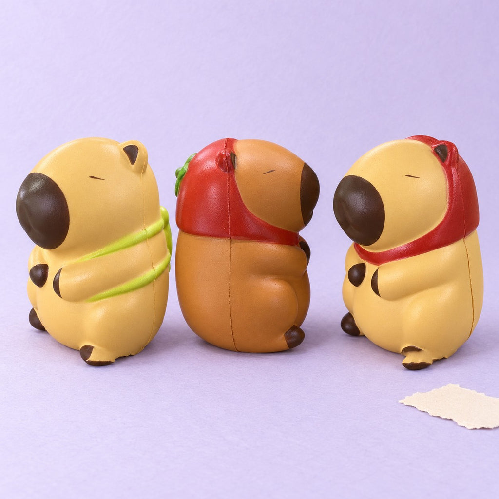 Capybara squishy set slow rising – Capybara Slow Rising Squishy, all 3, product photo on pastel paper