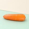 Carrot squishy crunchy – Crunchy Carrot Squishy, Crispy PU Vegetable, product photo on pastel paper