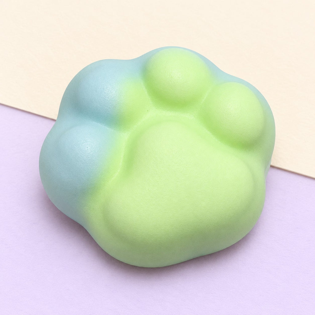 Cat paw squishy crunchy – Crunchy Cat Paw Squishy, 6 cm (Green), product photo on pastel paper