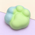 Cat paw squishy crunchy – Crunchy Cat Paw Squishy, 6 cm (Green), product photo on pastel paper