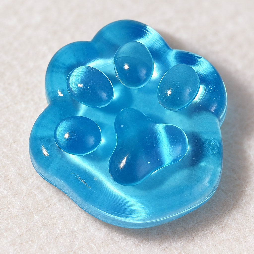Mini Jelly Cat Paw Squishy, 4 cm (Blue), close-up of the surface and details