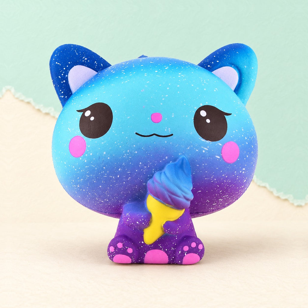 Cat squishy slow rising – Slow Rising Cat Squishy with Ice Cream, Scented (Motif A: Galaxy Cat), product photo on pastel paper