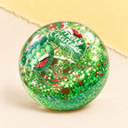 Christmas ball squishy coconut oil – Christmas Coconut Oil Squishy Ball in Gift Box, 6.5 cm (Snowflake, green), product photo on pastel paper