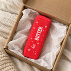 Christmas Butter Squishy, Crispy Stick in Gift Box (red), unboxed from a parcel with tissue paper