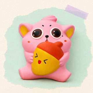 Chubby cat squishy slow rising – Chubby Cat Squishy with Acorn, Slow Rising, product photo on pastel paper