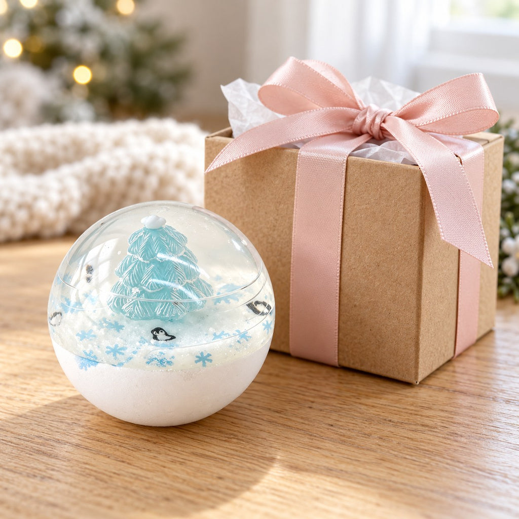 Christmas Coconut Oil Squishy Ball in Gift Box, 6.5 cm (Snowy tree, white), as a small gift next to a wrapped box
