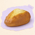 Country bread squishy slow rising – Country Bread Squishy, Golden Loaf 16 cm, product photo on pastel paper