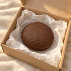 Chocolate cake squishy (Coffee chocolate), unboxed from a parcel with tissue paper