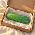 Crunchy Cucumber Squishy, Crispy PU Vegetable, unboxed from a parcel with tissue paper