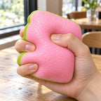 Crunchy Guava Squishy, Pink Slice, being squeezed by hand, soft and squishy