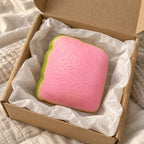 Crunchy Guava Squishy, Pink Slice, unboxed from a parcel with tissue paper