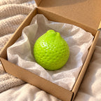Lemon squishy, unboxed from a parcel with tissue paper