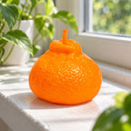 Orange squishy, on a sunny windowsill