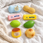 Crunchy Squishy Set, 8 Handmade Pieces, on a cozy bed with soft blankets