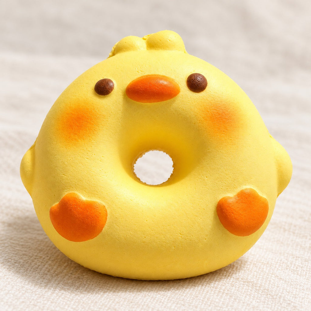 Squishy dónut cerdito o pato, pan flotador, primer plano de la superficie y los detalles