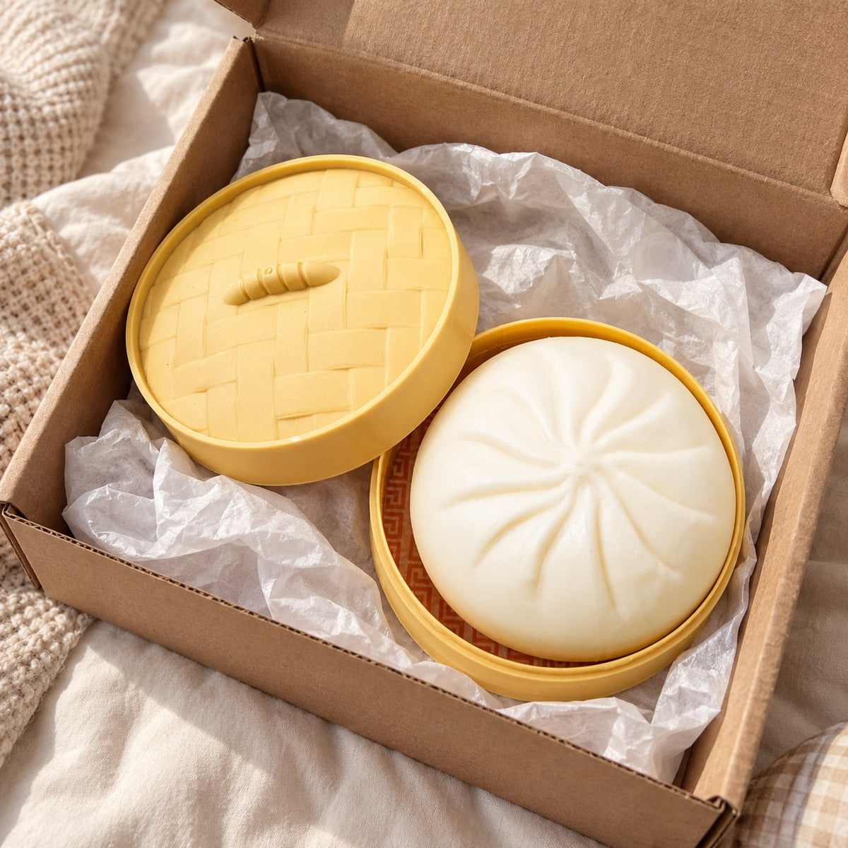 Bao Dumpling Squishy in Steamer Basket, unboxed from a parcel with tissue paper