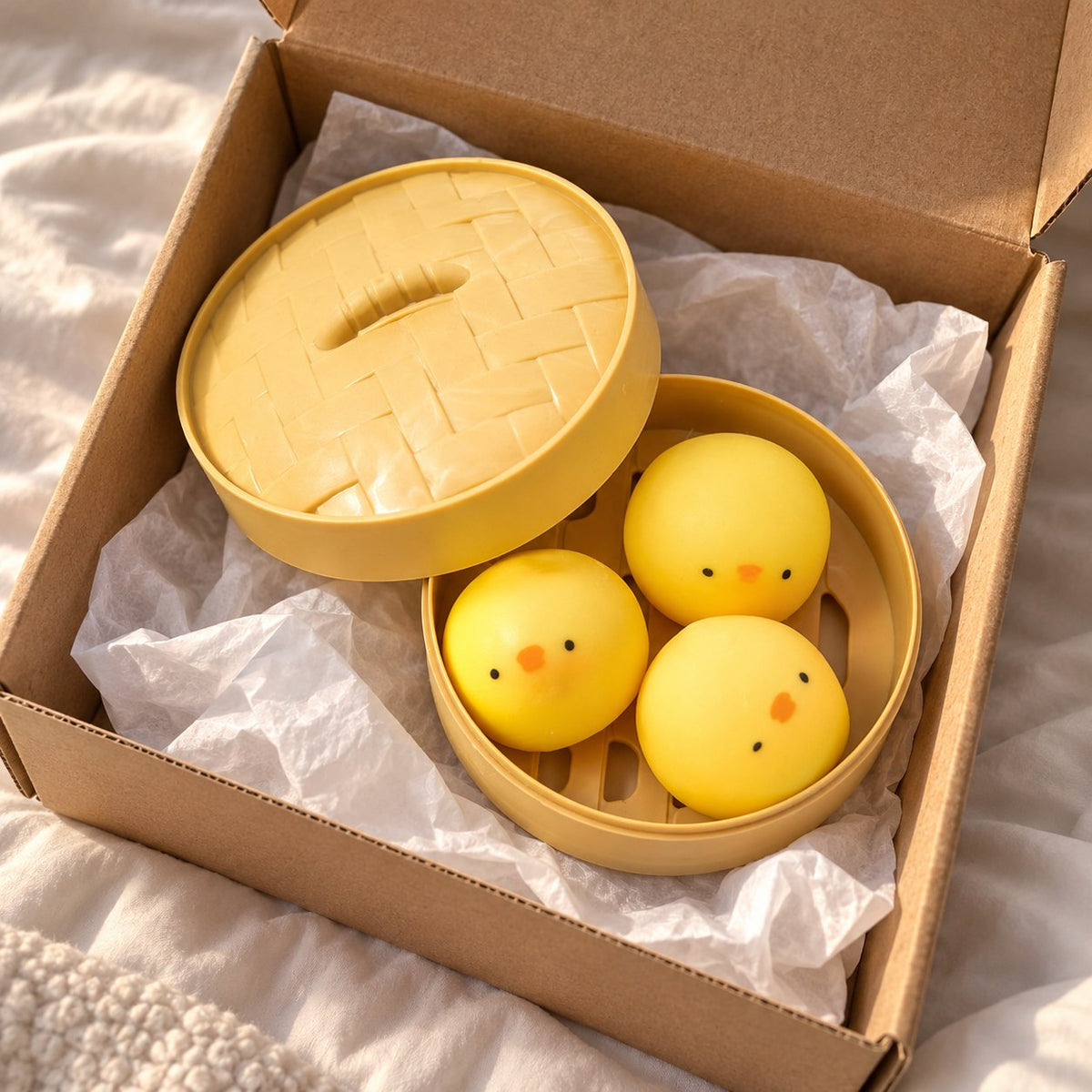 Chick Bao Squishy, 3 Buns in Steamer Basket, unboxed from a parcel with tissue paper
