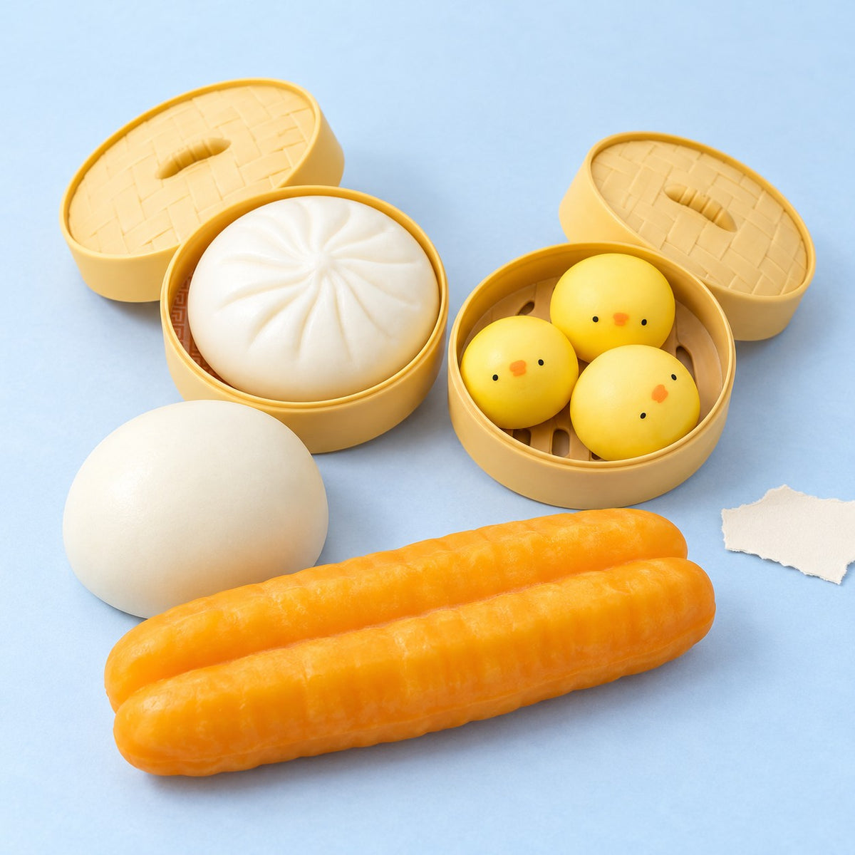 Dumpling squishy slow rising – Dumpling Squishy Set of 4, product photo on pastel paper