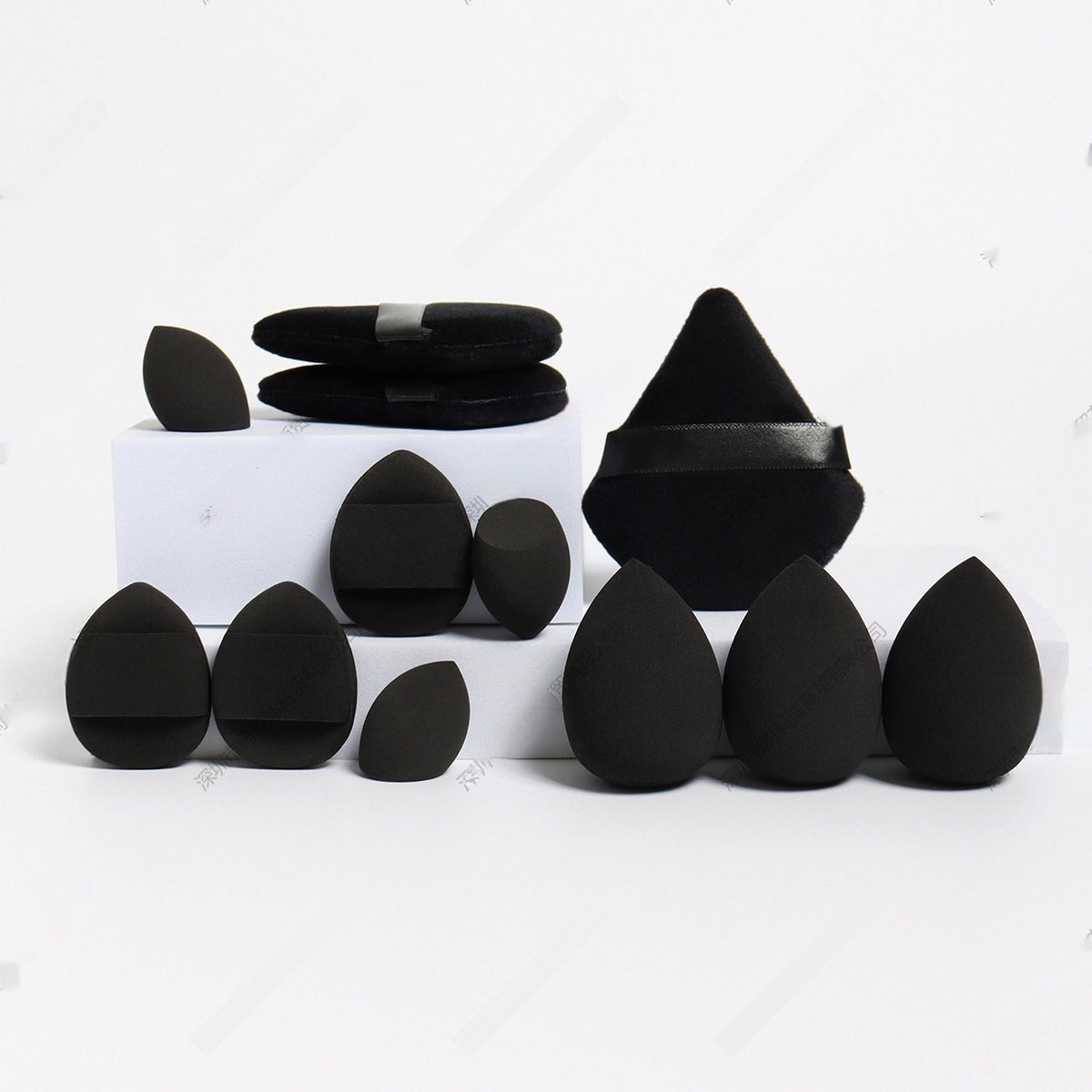 DIY sponge squishy supplies in black, triangle puffs and drop sponges