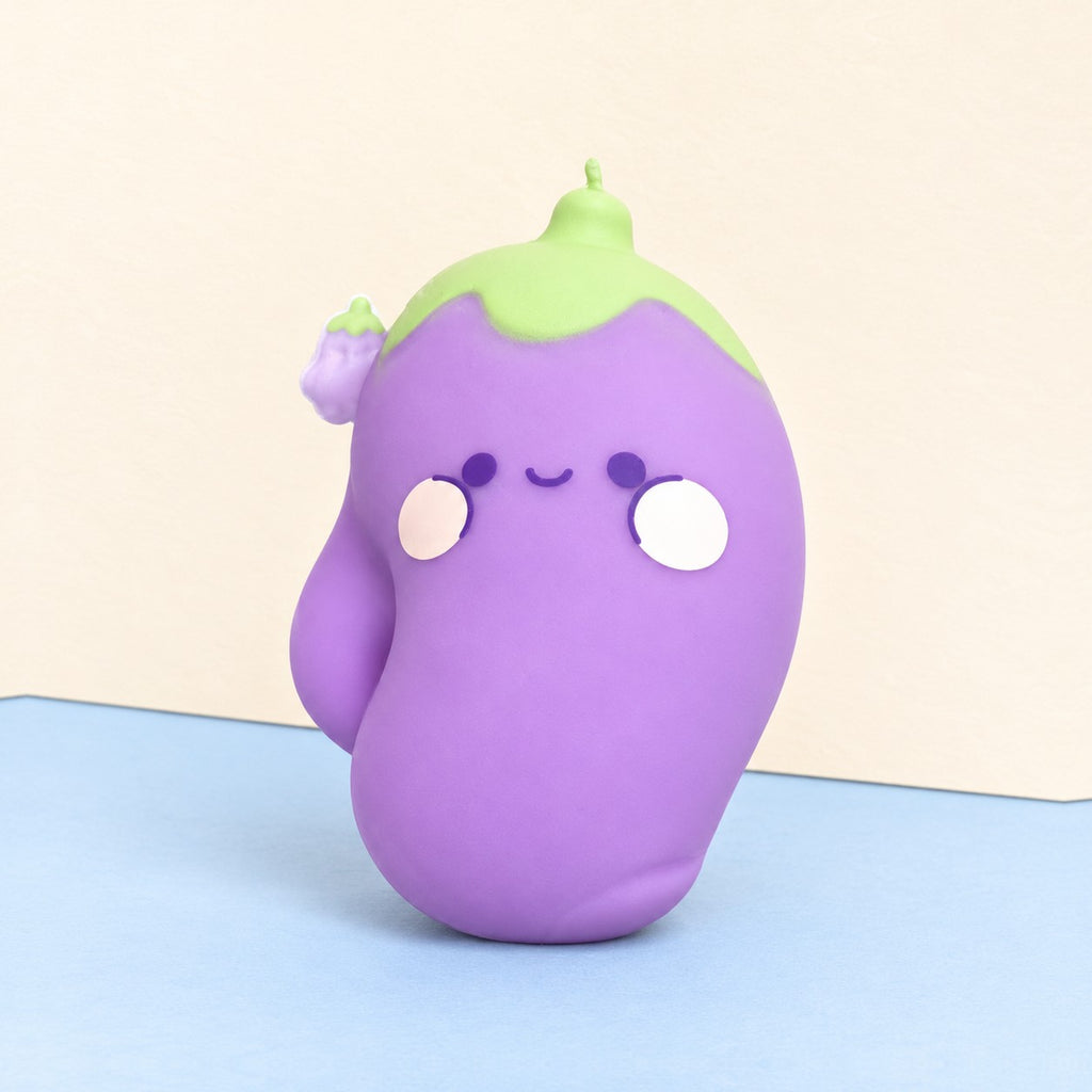 Eggplant squishy jumbo – Jumbo Eggplant Squishy, Kawaii Face, product photo on pastel paper