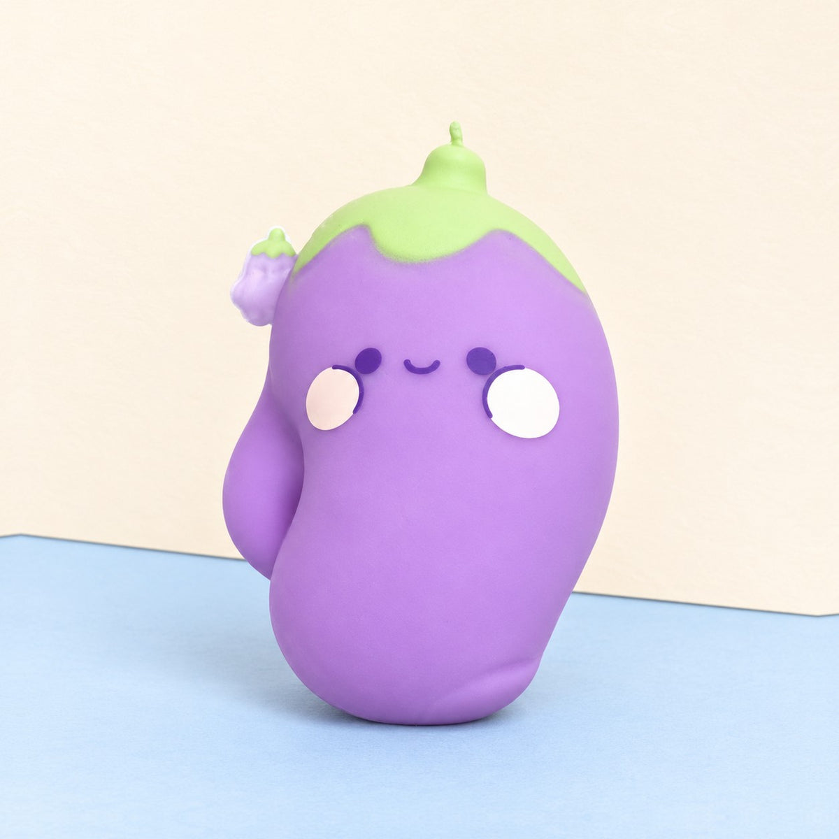 Eggplant squishy jumbo – Jumbo Eggplant Squishy, Kawaii Face, product photo on pastel paper