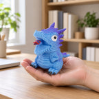Flip dinosaur egg squishy turns inside out (Blue, dino style random), held in a hand to show the real size