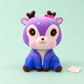 Galaxy deer squishy slow rising – Galaxy Deer Squishy, Slow Rising PU, product photo on pastel paper