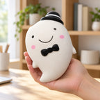Slow Rising Ghost Squishy, 14.5 cm (white), held in a hand to show the real size